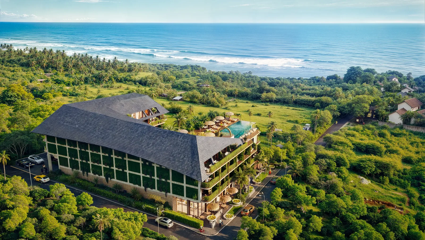 Aerial view of a cliffside Bali villa overlooking the ocean
